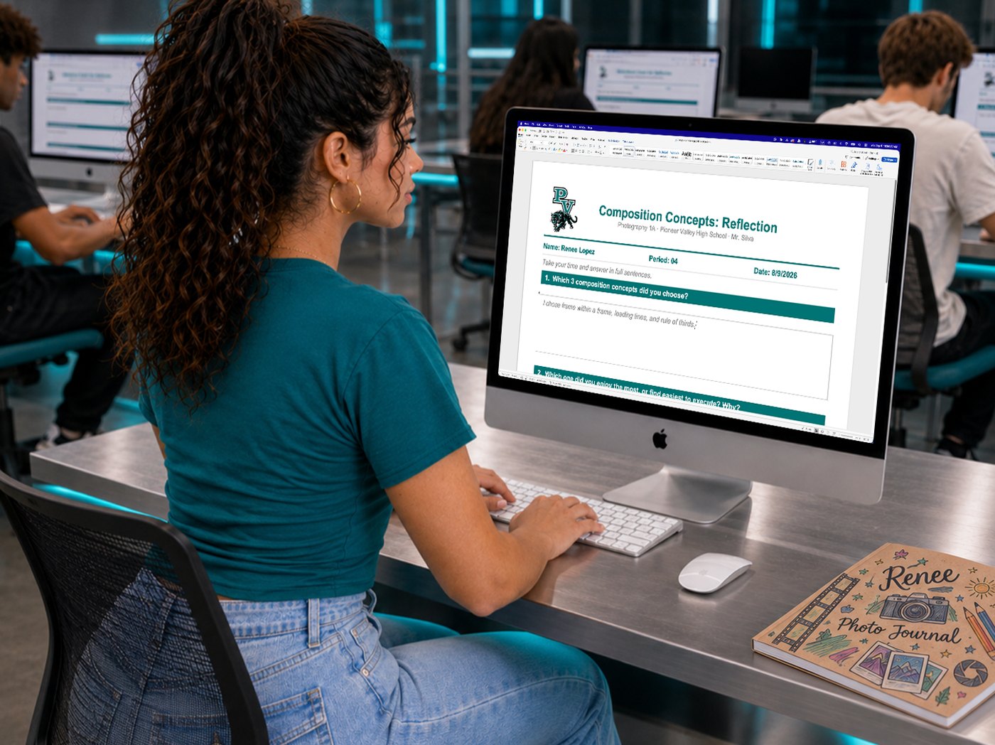 A student typing the Composition Concepts reflection on a lab computer