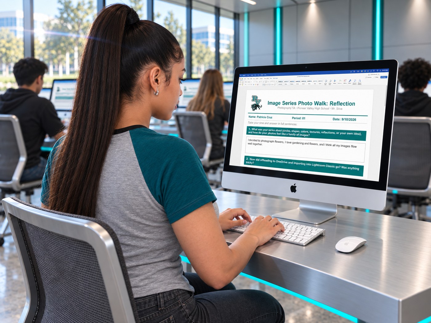 A Pioneer Valley student typing her Image Series reflection in the Word document on an iMac in the lab